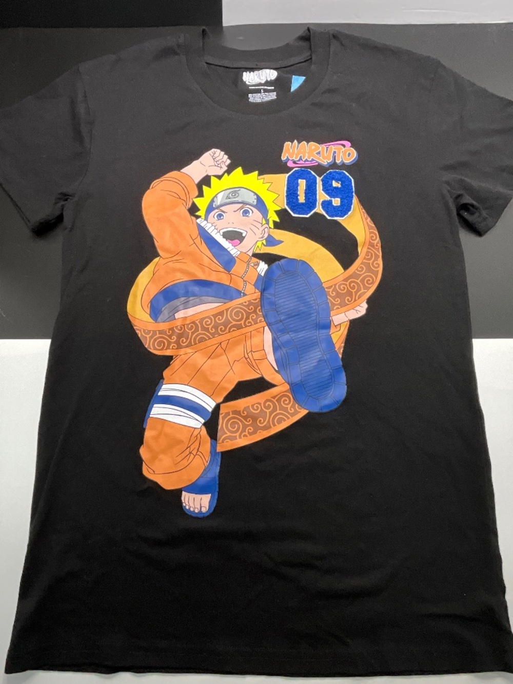 Naruto Black T with graphic on front and back. Young Adult Small. NWT.